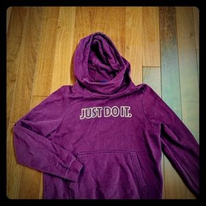Women's maroon Nike hooded sweatshirt.